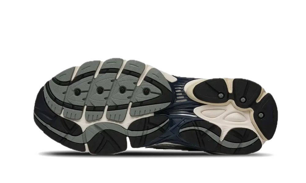 Saucony ProGrid Omni 9 TMY White Navy — vue de profil